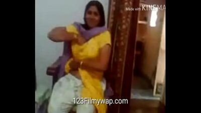 Indian school teacher showing boobs to student
